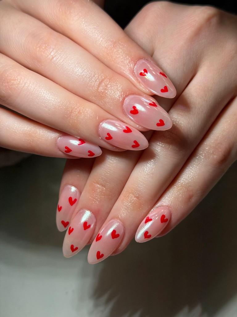 Pink builder gel nails with red hearts at Neo Nails Brickell in Miami